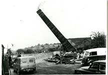 The demolition of one of the chimneys at Blists Hill's brick and tile works following its closure in 1956.