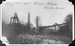 Blists Hill mine pit head, canal and brickworks, c.1900-1920. The inclined bridge over the canal was used to transport clay from the mine to the clay preparation area at the brickworks. By this time the canal was out of use.