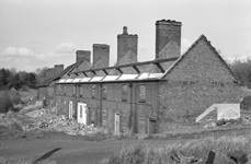A row of terraced cottages being demolished at Blists Hill, 1965. 