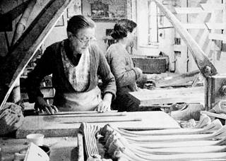 Clara Bagley and Ida Bennet working at William Southorn and Co. Tobacco Pipeworks, Broseley, c.1956.