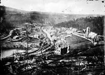 Historic photograph of Coalbrookdale showing the industrial buildings, the church and some houses