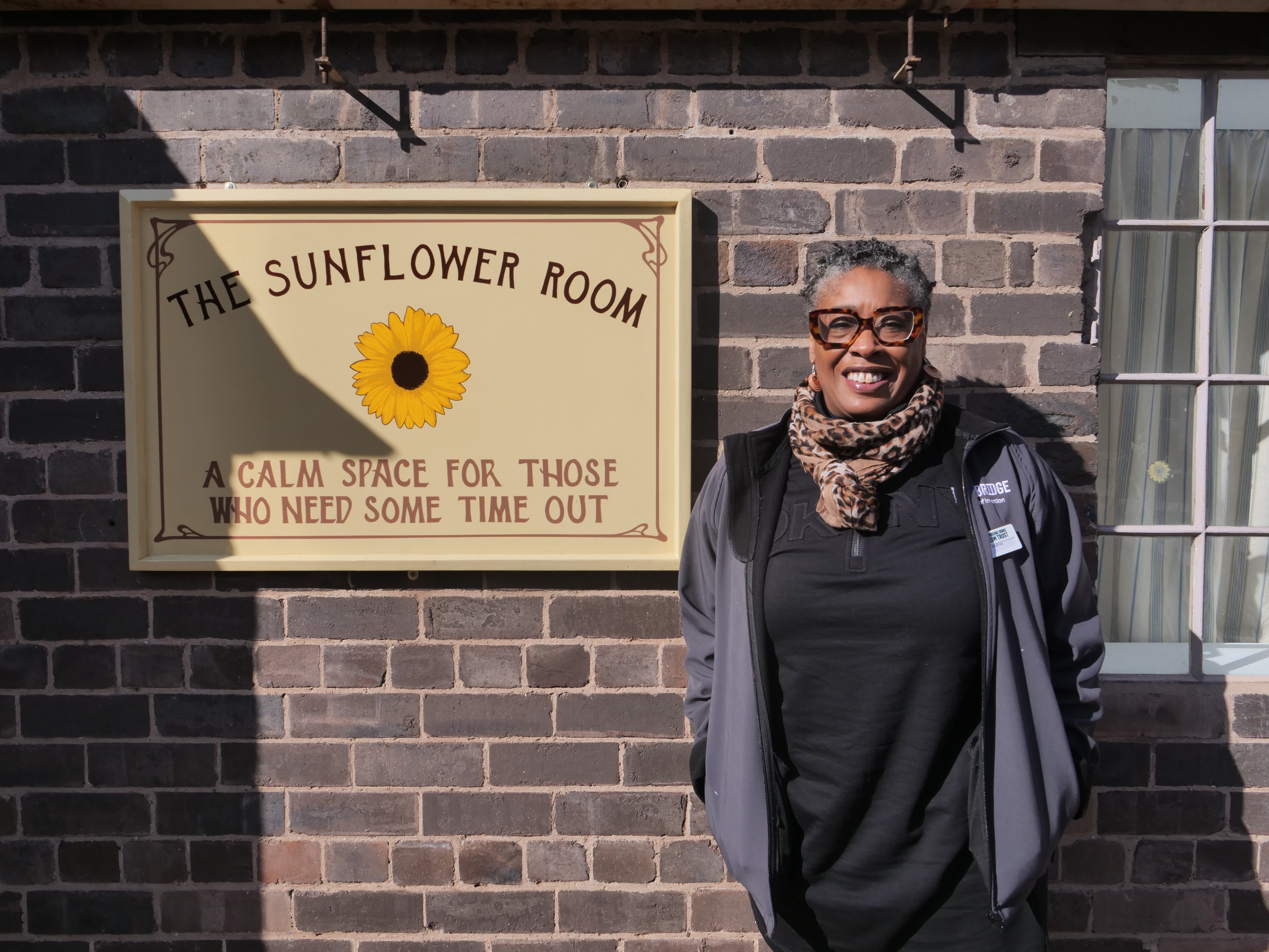 IGMT Community Engagement And DEI Manager Andrea Nelson In Front Of The Sunflower Room At Blists Hill Victorian Town