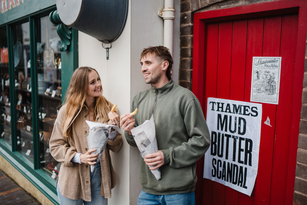 Couple eating chips at Blists Hill Victorian Town